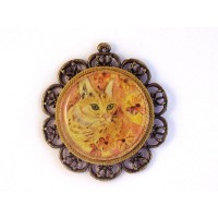 Dije de bronce antiguo. Camafeo con diseo de gato.