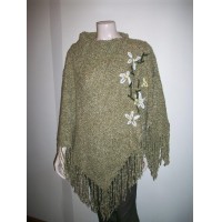 PONCHOS ARTESANALES EN TELAR