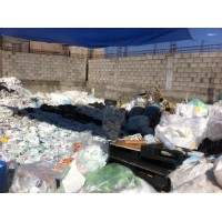 Carga materia prima, carton, plastico polietileno, poliestireno, telas